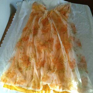 Antique 1970 nightgown with pretty lacing at the neck and petticoat